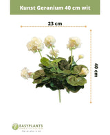Geranio artificial 40 cm blanco: planta artificial con hojas verdes, altura 40 cm y ancho 23 cm, bellamente expuesta sobre un fondo blanco con dimensiones claras.
