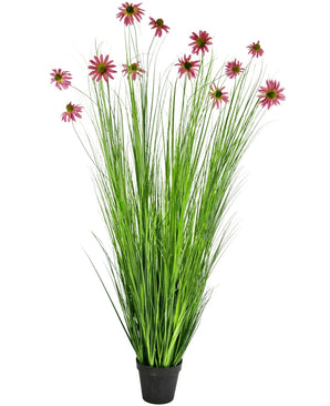 La planta de césped artificial Crisantemo 180 cm retardante de fuego es una planta artificial en maceta con hojas altas y delgadas de color verde similar a la hierba y flores de crisantemo rosadas en tallos largos, representadas sobre un fondo blanco.