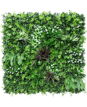 El Seto Artificial Sillage 100x100 cm UV es un panel de pared cuadrado con una densa vegetación artificial, con varios helechos y plantas de follaje para un efecto de jardín vertical exuberante y animado.