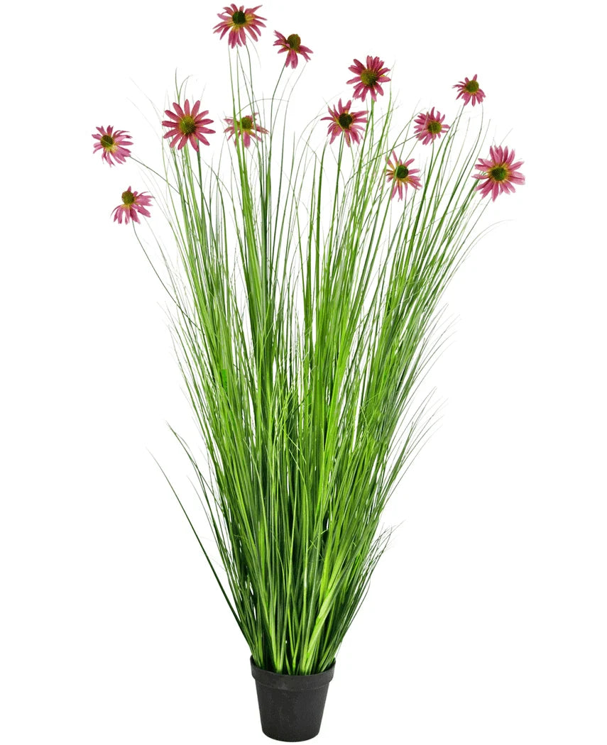 La planta de césped artificial Crisantemo 180 cm retardante de fuego es una planta artificial en maceta con hojas altas y delgadas de color verde similar a la hierba y flores de crisantemo rosadas en tallos largos, representadas sobre un fondo blanco.
