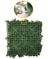 Seto artificial Boj azul 50x50 cm: Panel UV con hoja de boj artificial colocada sobre una rejilla de plástico verde. Una incrustación circular en la parte superior muestra un primer plano del mecanismo de bloqueo que permite unir varios paneles.