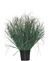 De Kunst Grasplant Gazon groen 50 cm brandvertragend heeft lange, dunne, groene grasachtige bladeren die zich naar buiten verspreiden - ideaal om een vleugje groene interieurstijl aan je ruimte toe te voegen.